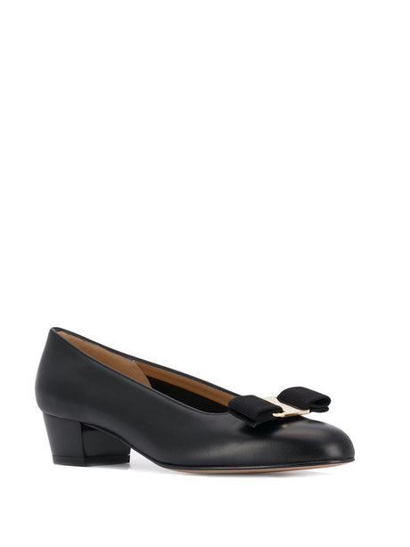 Classic Black Leather Flats with Signature Bow Detail and Low Block Heel for Women