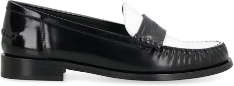 Giày lười nữ da bò màu đen với da bò lộn bbrush, đầu tròn và chi tiết cột dây FW23