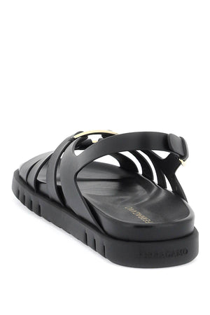 FERRAGAMO Glamorous Black Flatform Sandals for Women with Golden Gancini Hook Ornament