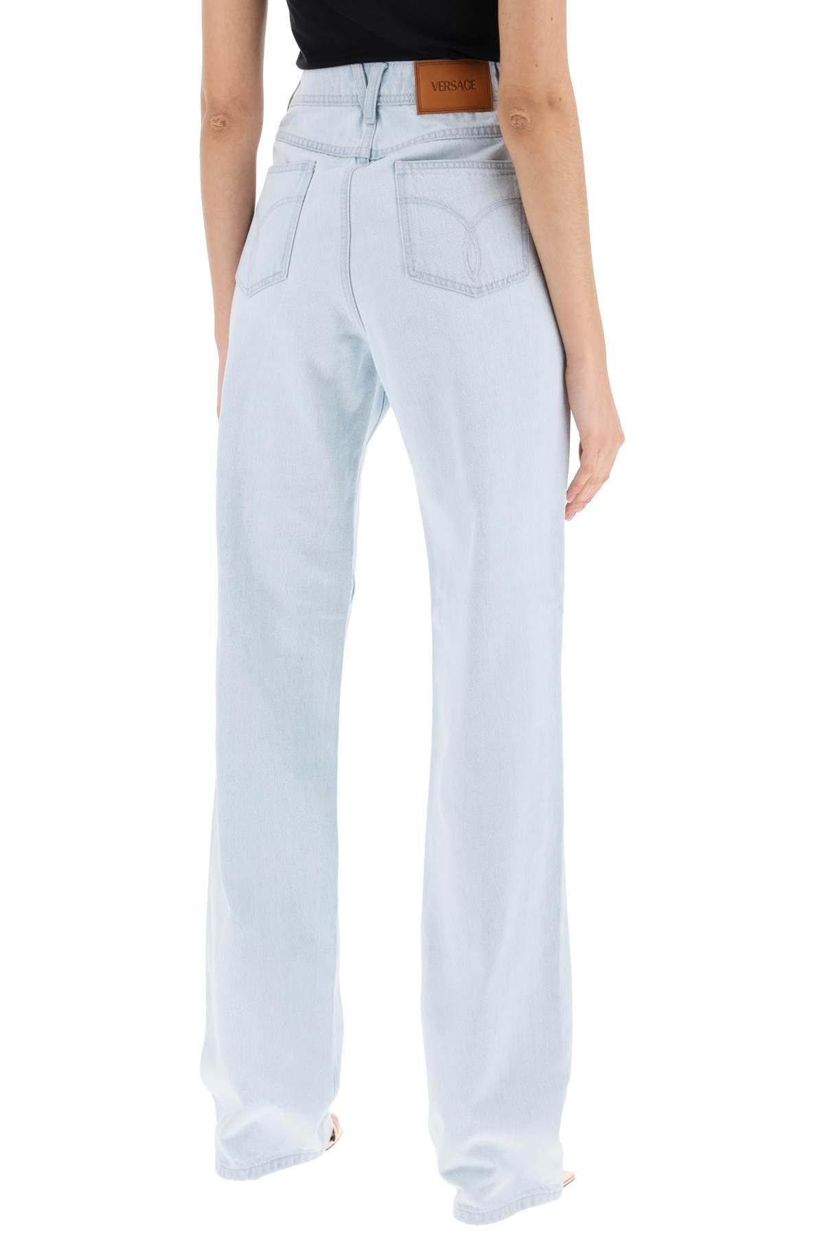 VERSACE Light Blue High-Waisted Straight Cut Relaxed Fit Jeans with Silver Medusa Details