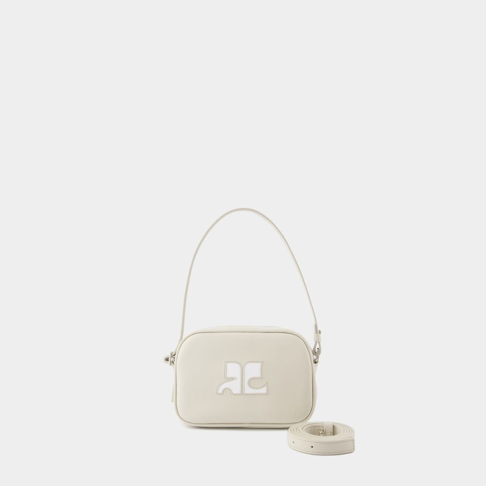 COURREGÈS Slim Camera Handbag - Perfect for the Fashion-Forward