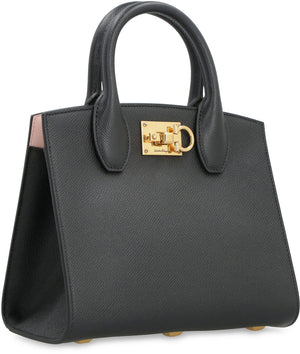 FERRAGAMO Classic Black Mini Leather Handbag with Gold-Tone Hardware and Removable Strap - 22x18 cm