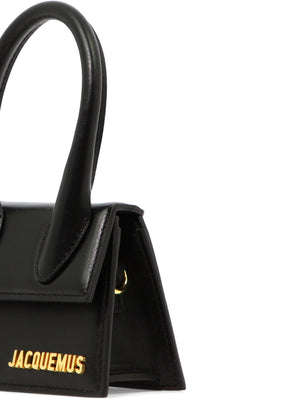 Elegant Black Leather Micro Handbag with Oversized Handle and Magnetic Closure