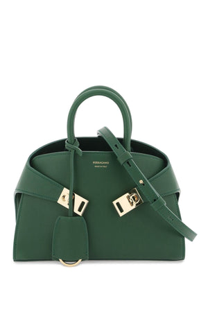FERRAGAMO Chic Mini Leather Handbag with Gold Gancini Clasp and Adjustable Strap - Spring Green