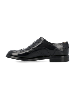 حذاء أسود ممشط من جلد العجل للسيدات مع تفاصيل بروغ ونعل مطاطي بألماس