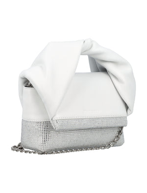 حقيبة يد صغيرة بتصميم أنيق من جلد ناعم مع تغطية بلورات كريستالية