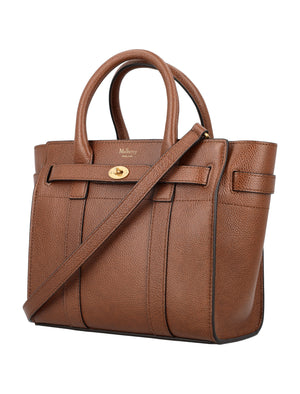 حقيبة يد جلدية صغيرة بسحاب وقفل الساعي - لون بني بلوطي، 23x21x12.5 سم