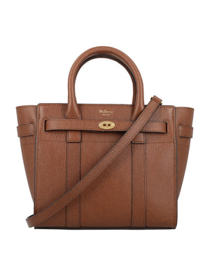 حقيبة يد جلدية صغيرة بسحاب وقفل الساعي - لون بني بلوطي، 23x21x12.5 سم