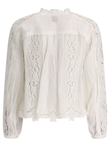 Áo blouse trắng tay bóng bay với chi tiết ren và đường xẻ hai bên
