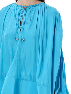 قميص واسع مزركش باللون الفيروزي للنساء - مجموعة ربيع وصيف 2024