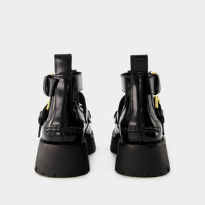 ALEXANDER WANG Black Carter Lug Ankle Boots for Women (SS24 Collection)