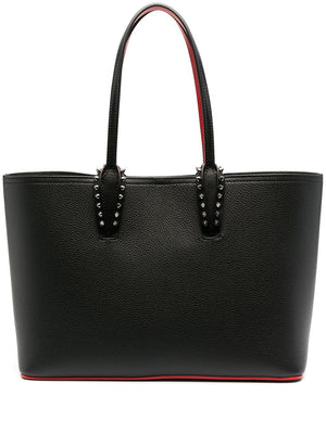 حقيبة يد جلدية سوداء مزيّنة بشكل جذّاب من الفضة وتصميم ثنائي اللون