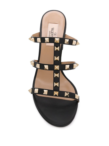 VALENTINO GARAVANI Luxury Black Leather Sandals for Women with Gold-Tone Stud Detailing and Mid Block Heel