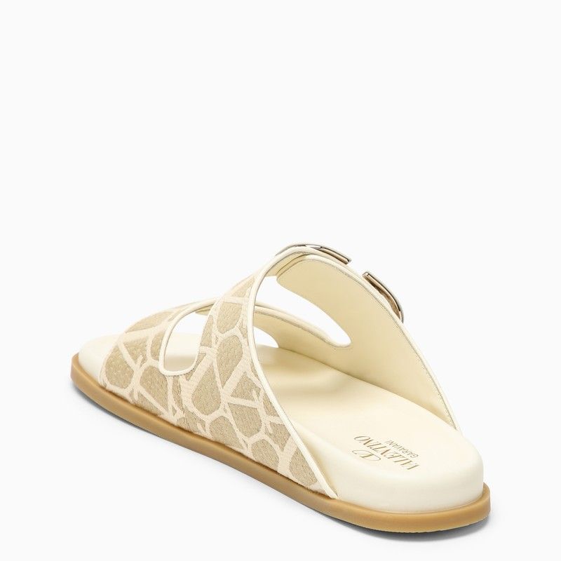 VALENTINO GARAVANI Signature V Logo Slide Sandals for Women in Nude & Neutrals