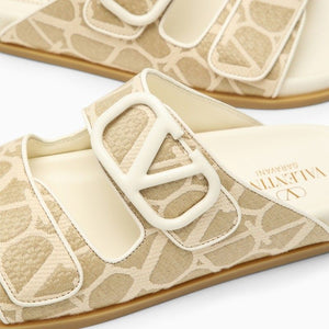 VALENTINO GARAVANI Signature V Logo Slide Sandals for Women in Nude & Neutrals