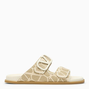 VALENTINO GARAVANI Signature V Logo Slide Sandals for Women in Nude & Neutrals