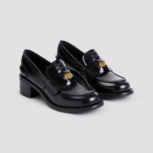 MIU MIU Chic Black Leather Mini-Moccasins with 2-inch Heel