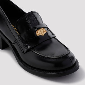 MIU MIU Chic Black Leather Mini-Moccasins with 2-inch Heel