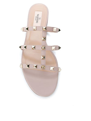 VALENTINO GARAVANI Chic Studded Leather Flat Sandals