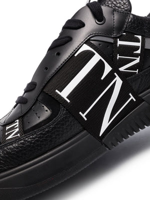 VALENTINO GARAVANI Contemporary Black Leather Sneakers with Logo Accent