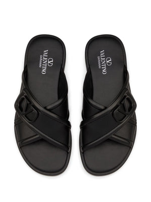 VALENTINO Signature Slide Sandals in Black Leather