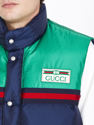 Áo gile dày lót vải nylon màu xanh và xanh lá cây với hình ảnh logo cổ điển Gucci và chi tiết web