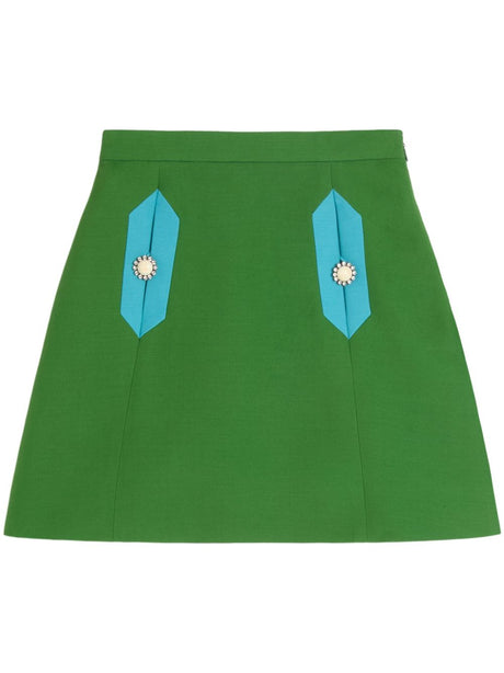 VALENTINO Mini Skirt with Elegant Brooch Detail