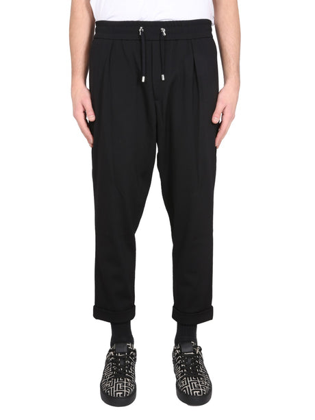 BALMAIN Sleek Wool Trousers with Hidden Front Zipper Closure