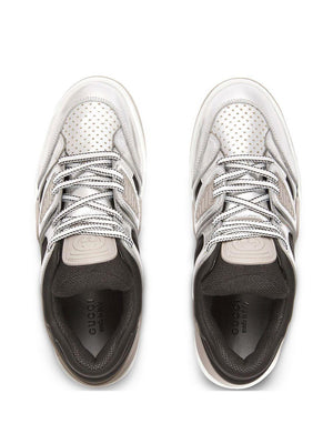 GUCCI Elevate Your Style with this Silver and Black Metallic-Leather Sneaker