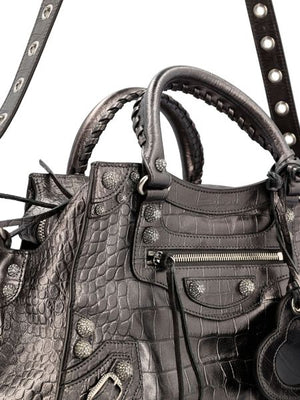 BALENCIAGA Elegant Embossed Metallic Handbag for the Modern Fashionista