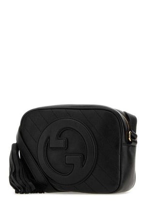 GUCCI Quilted Leather Shoulder Handbag with Decorative Tassel and Adjustable Strap