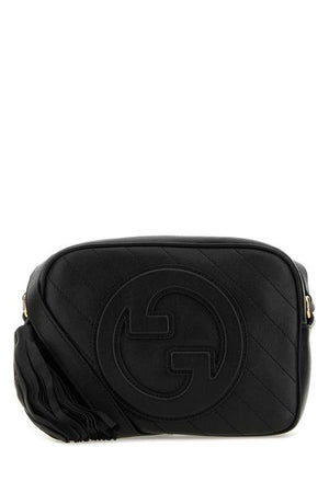 GUCCI Quilted Leather Shoulder Handbag with Decorative Tassel and Adjustable Strap