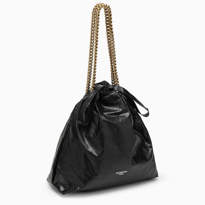 Black Leather Chain Tote Handbag with Drawstring Closure and Gold-Tone Hardware