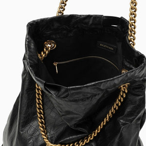 Black Leather Chain Tote Handbag with Drawstring Closure and Gold-Tone Hardware