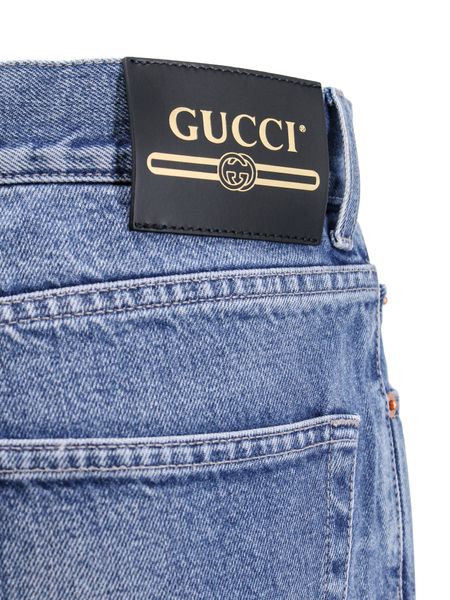 GUCCI Modern Fashionista's Ultimate Pick: Ultra-Modern Black Wash Cropped Jeans with Signature Logo Patches