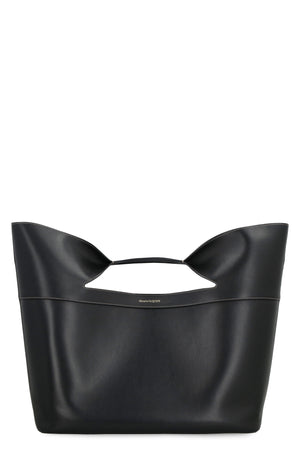 獨具品味的黑色皮革蝴蝶結手提包 - FW23