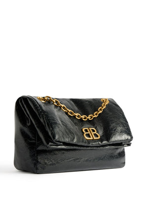 BALENCIAGA Elegant Small Black Leather Shoulder Bag with Gold-Tone Hardware and Sliding Chain Strap (11”x7”x4”)