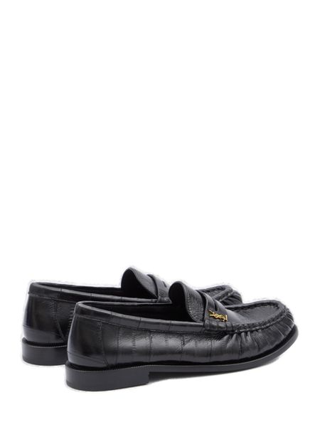 SAINT LAURENT Worn-out Effect Black Leather Loafers for Women with Gold-Tone YSL Monogram