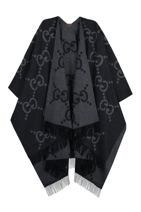 GUCCI Reversible Cashmere Poncho with Leather Details and Fringed Hemline