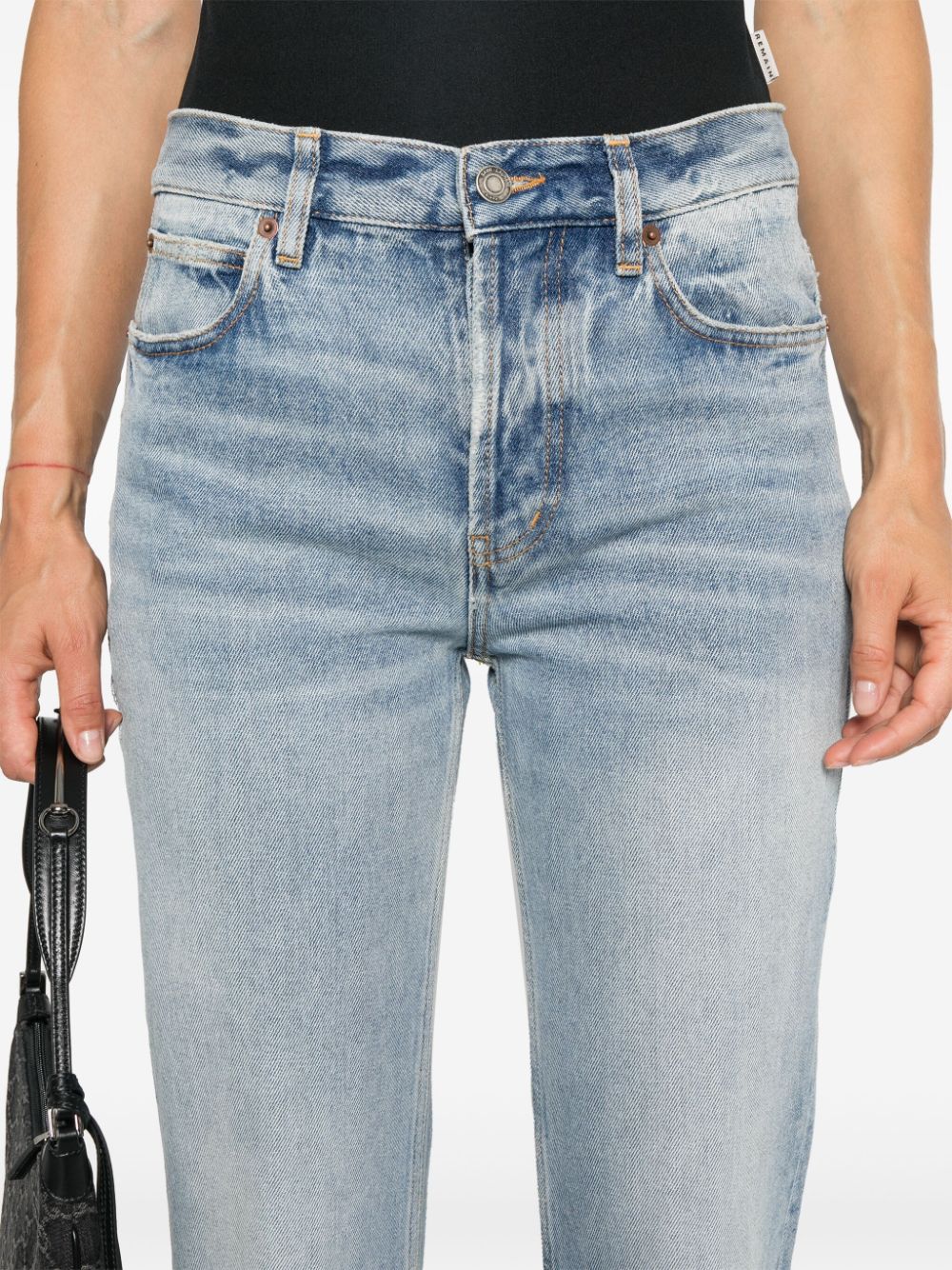 SAINT LAURENT Low-Rise Denim Jeans