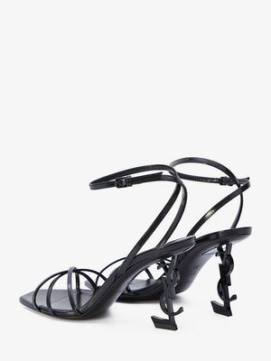 Black Leather Sandals with Metallic Sculpture Heels and Adjustable Ankle Strap