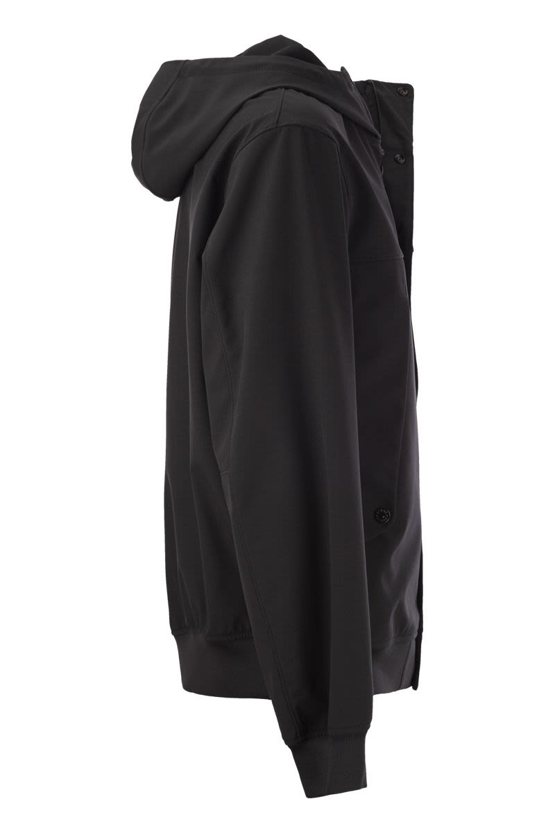 Áo khoác nam đen vải Techno chất liệu dẻo, có thể thay logo, có cạp rib và 2 túi hai bên