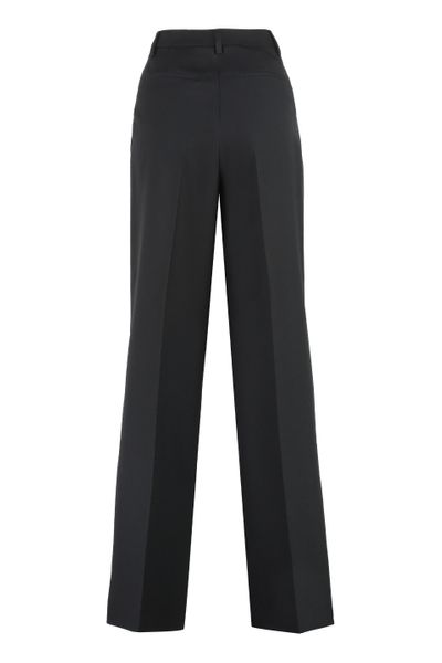 Pleated Wide-Leg Wool Trousers in Black - مجموعة الربيع/الصيف 2024