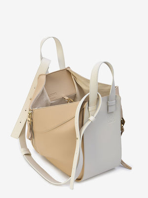 LOEWE Chic White and Beige Mini Hammock Calfskin Handbag with Embossed Detail, Adjustable Strap, and Multiple Pockets - 25x13.5x30 cm