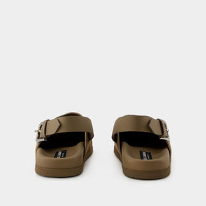 DOLCE & GABBANA SUEDE LEATHER CLOGS WITH LOGO PLATE