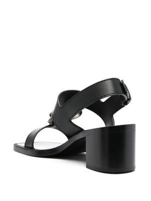 ALAIA Black Leather Sandals with Heart Charm and Block Heel - FW23 Collection