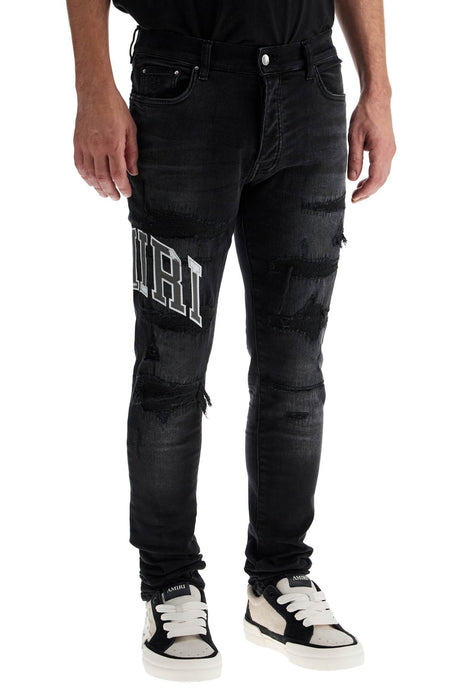 AMIRI Distressed Low-Rise Skinny Jeans with Varsity Logo - Size 31