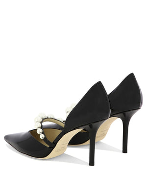 JIMMY CHOO Black Patent Leather Pumps for the Fashionable Woman