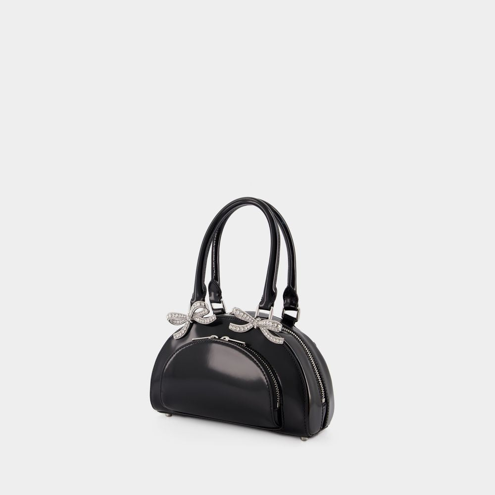 SELF-PORTRAIT Chic Curved Mini Leather Handbag