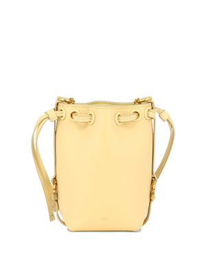 الحقيبة اليدوية الميكرو مارسي الصفراء للنساء - تصميم مستوحى من السبعينيات
